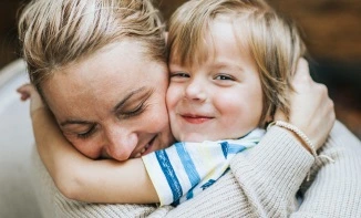 woman and child hugging