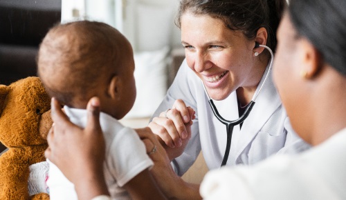 doctors with a baby